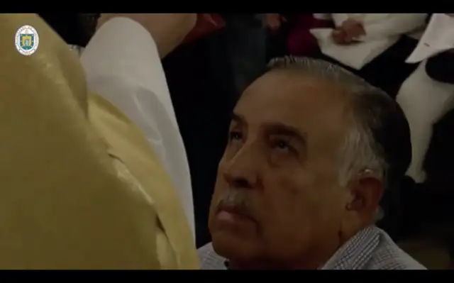 Bishop denies Communion to kneeling Catholics