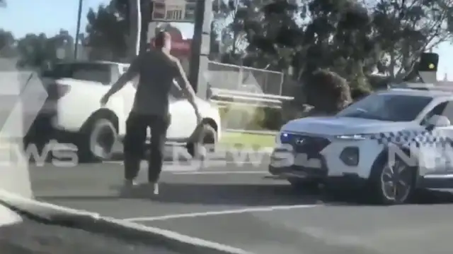 Australian police plow man with car, stomp on his head