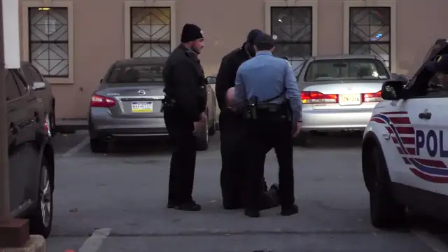 Catholic priest arrested at Red Rose Rescue, Dec. 2, 2017