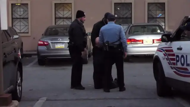 Catholic priest arrested at Red Rose Rescue, Dec. 2, 2017