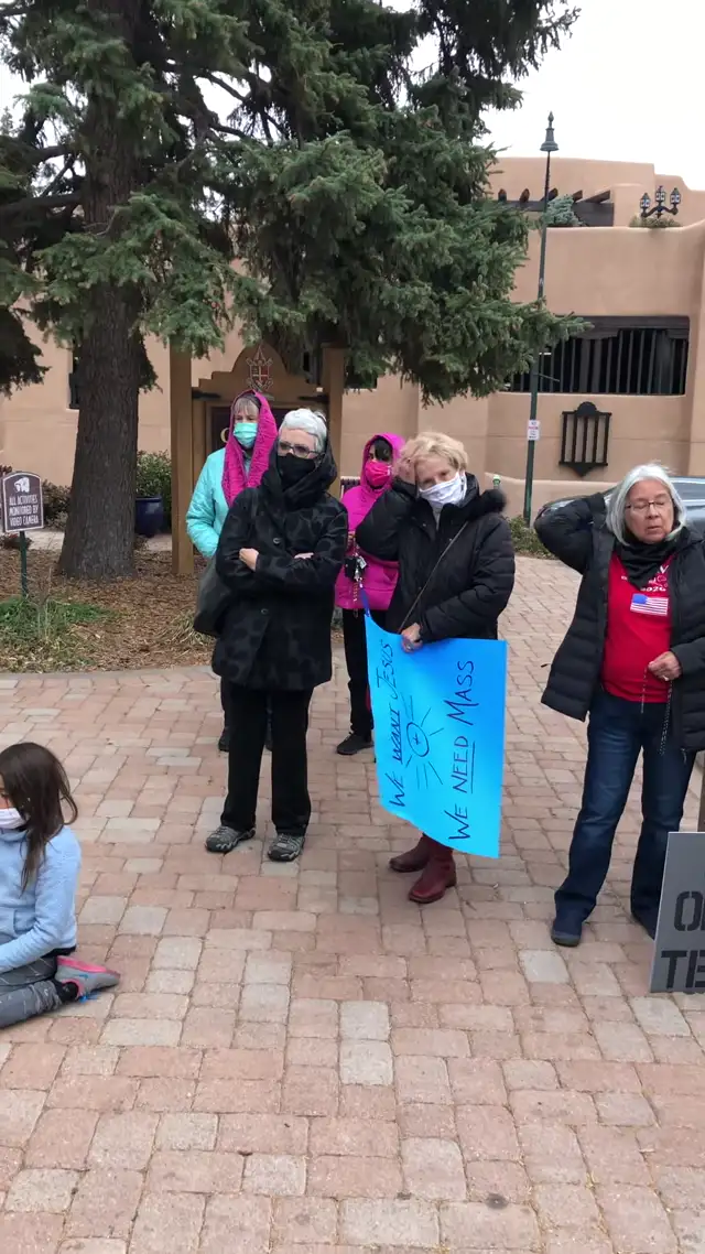 Protesters petition reopening of Santa Fe churches outside cathedral